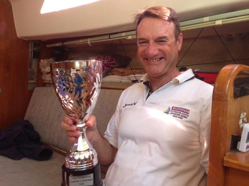 In the hands of the current holder, Robert Alder with the OCL Cup that will be stowed on OCL One for the New Year coastal sprint north © Bob McClung